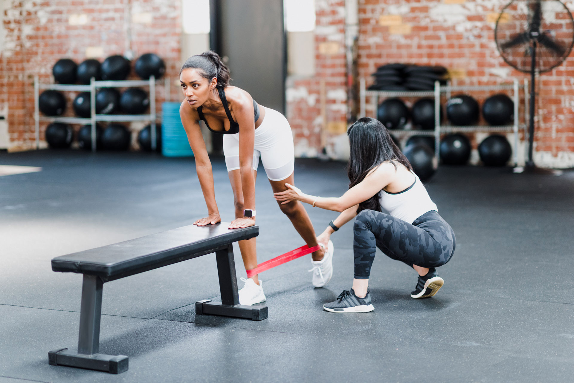 Physical therapist guiding a patient through movement